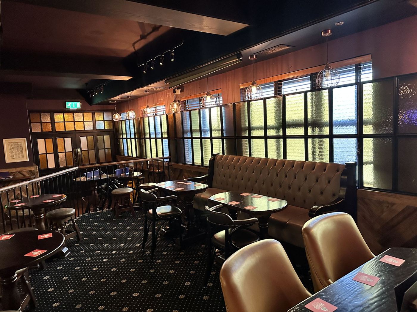 The lounge with leather booths and big windows